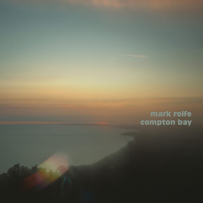 Ethereal and misty coastal cover art for Compton Bay by Mark Rolfe, evoking the serene atmosphere of the Isle of Wight.