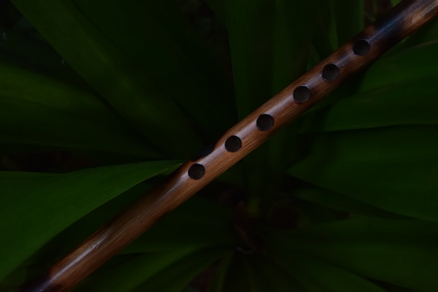 Cinematic shot of a wooden flute representing the Shire themes in Lord of the Rings.