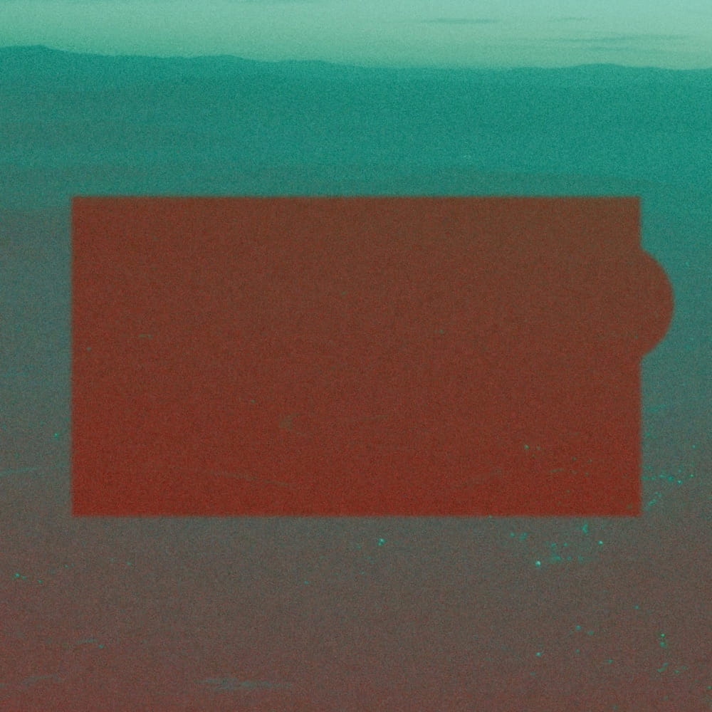 A vintage cassette player and piano keys, reflecting the dusty lo-fi aesthetic of grainShift_.