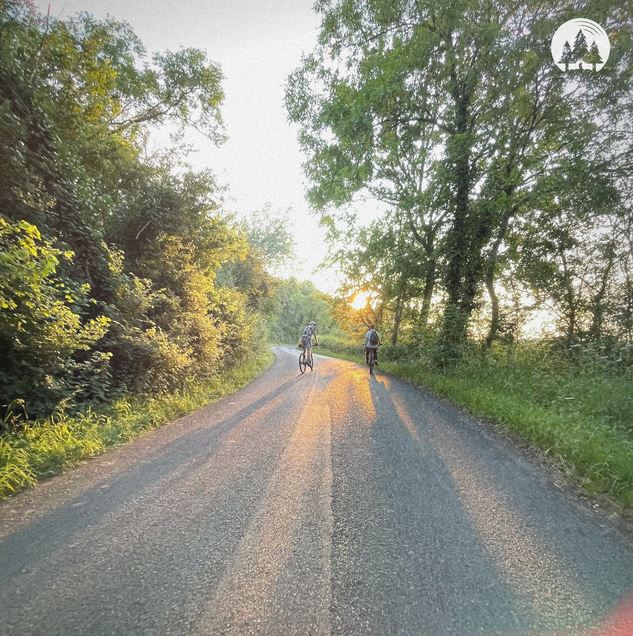 A cozy home studio setup with a saxophone on a stand and a guitar by the window, capturing the warm atmosphere and organic sound of the track "What a Day."