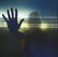 Dark and cinematic cover art for 8mm's Over and Over, evoking a mysterious trip-hop and David Lynch aesthetic.