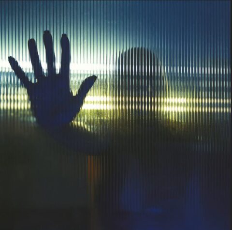 Dark and cinematic cover art for 8mm's Over and Over, evoking a mysterious trip-hop and David Lynch aesthetic.